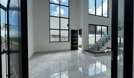 Casa de condomínio para venda tem 388 metros quadrados com 4 quartos