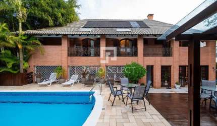 Casa com 767 m², 6 quartos sendo 4 suítes à venda no bairro Uberaba.