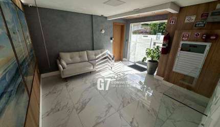 Apartamento com 2 dormitórios à venda, 56 m² por R$ 339.000,00 - Mirim - Praia Grande/SP