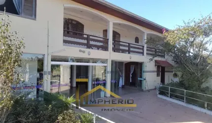 Imóvel de Luxo: Casa à Venda em Curitiba-PR, 4 quartos, 1 suíte, 2 salas, 2 vagas de garagem e 700m² de área no Tatuquara!