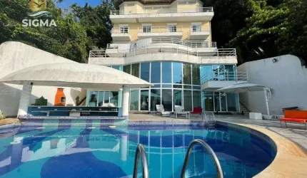 Casa de altíssimo padrão de frente para o mar com 11 suítes, lazer completo e 6 vagas - Península, Guarujá.