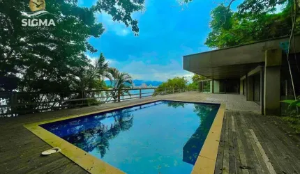 Casa com 5 suítes, piscina e vista para o mar com 2 vagas - Peninsula, Guarujá.