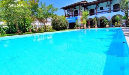 Casa com 5 dormitórios à venda, 550 m² por R$ 7.000.000,00 - Jardim Acapulco - Guarujá/SP