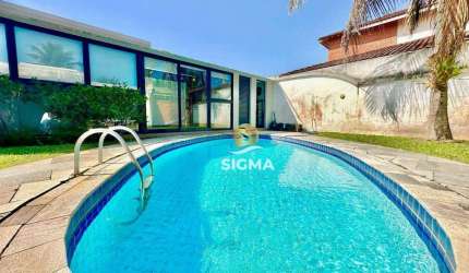Casa com 4 dormitórios à venda, 240 m² por R$ 1.680.000,00 - Jardim Acapulco - Guarujá/SP