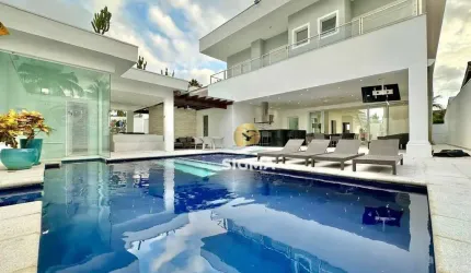 Casa com 5 Suítes à venda no Condomínio Jardim Acapulco - Guarujá/SP.