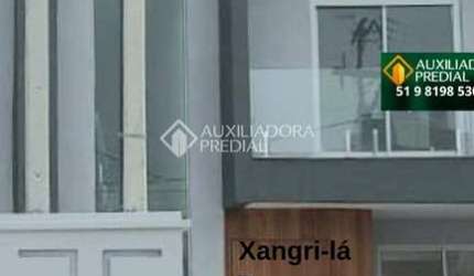 Casa com 3 quartos à venda na Dr. Mário Azevedo Silveira, 111, Remanso, Xangri-Lá, 134 m2 por R$ 731.000