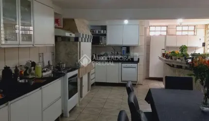 Casa em condomínio fechado com 3 quartos à venda na CRISANTEMO, 684, Cecília, Viamão, 168 m2 por R$ 600.000