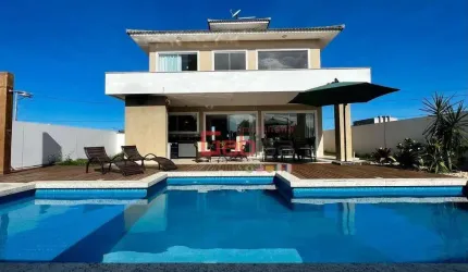 Casa com 3 dormitórios para alugar, 130 m² por R$ 10.641,74/mês - Guriri - Cabo Frio/RJ