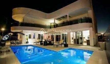 Casa em condomínio fechado com 5 quartos à venda na Rua das Caraúnas, 463, Jurerê Internacional, Florianópolis, 739 m2 por R$ 12.000.000