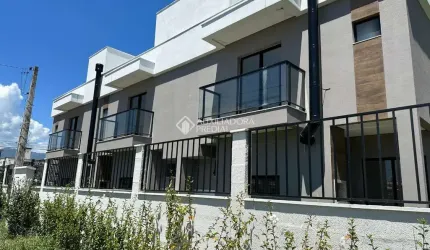 Casa em condomínio fechado com 3 quartos à venda na Avenida Aleixo Alves de Souza, 892, Nova Palhoça, Palhoça, 98 m2 por R$ 660.295