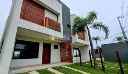Casa com 3 quartos à venda na Roberto Teixeira De Souza, 7, Ibiraquera, Imbituba, 129 m2 por R$ 1.491.009
