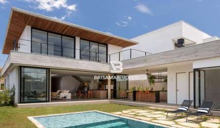 CASA DE ALTO PADRÃO EM CONDOMÍNIO PRIVILEGIADO NO GUARUJÁ – 5 SUÍTES, ÁREA GOURMET E BEACH HOUSE
