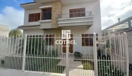 Casa 3 dormitórios 1 suíte 2 vagas de garagem localizada no Bairro Alto da Boa V