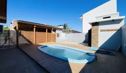 Casa para venda e locação com 3 dormitórios, 3 vagas de garagem situada no Bairr