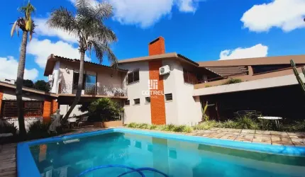 Casa para venda 4 dormitórios sendo 1 suíte, piscina situada no Bairro Camobi na