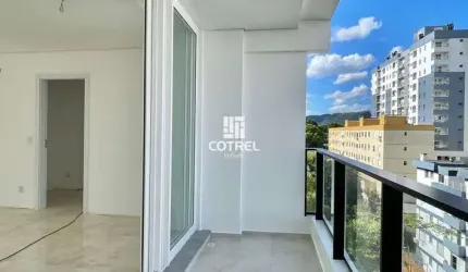 Apartamento 2 dormitórios, suíte e 2 vagas de garagem no Bairro Centro