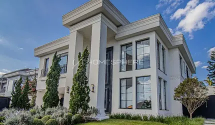 Casa de condomínio com 600 m², 5 quartos sendo 5 suítes à venda no bairro Aldeia da Serra.