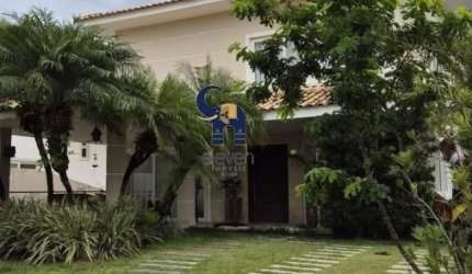 EXCELENTE CASA A VENDA  ALPHAVILLE 1 6/4 SENDO 4 SUITES, HOME E COZINHA COM 2 DEPENDENCIAS E 4 VAGAS CONDOMÍNIO ITAPARICA.