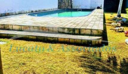 Casa isolada na Mirim Praia Grande SP, sendo 04 dormitorios, 01 suite, 03 banheiros, 01 sala, 05 vagas, area de serviço, churrasqueira, area gourmet,