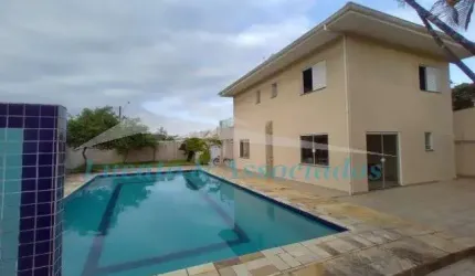 Sobrado no Balneario Florida, Praia Grande SP, sendo 04 dormitorios, 02 suites, 04 vagas, 03 banheiros, piscina, quintal com churrasqueira, fogão de l