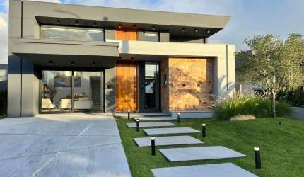 Casa em condomínio fechado com 3 quartos à venda na Rua Onório Germano, 2009, Araça, Capão da Canoa, 180 m2 por R$ 1.850.000
