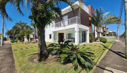 Casa em condomínio fechado com 5 quartos à venda na Avenida Central, 11, Zona Nova, Capão da Canoa por R$ 1.800.000