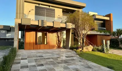 Casa em condomínio fechado com 4 quartos à venda na Avenida Paraguassu, 551, Centro, Xangri-Lá por R$ 1.950.000