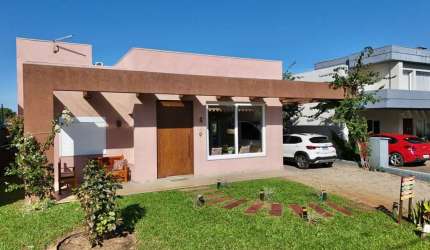 Casa em condomínio fechado com 3 quartos à venda na Rua Onório Germano, 2009, Araça, Capão da Canoa por R$ 1.200.000