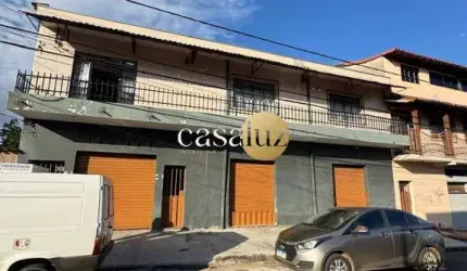 Casa com 2 lojas mais 3 barracões localizada no bairro Industrial /Contagem