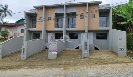GEMINADOS A VENDA COM 2 SUÍTES NO BAIRRO FLORESTA