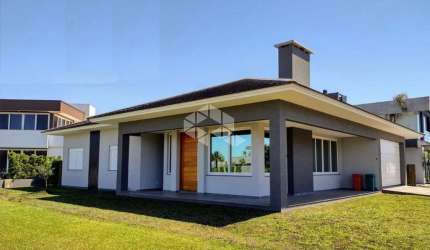Casa á venda com 4 quartosdormitorios 3 vagasbox no condominio Lagoa do Passo, OsorioRS
