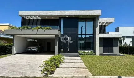 Sobrado com 4 Suítes, garagem coberta para 02 carros em Atlântida Sul/RS!