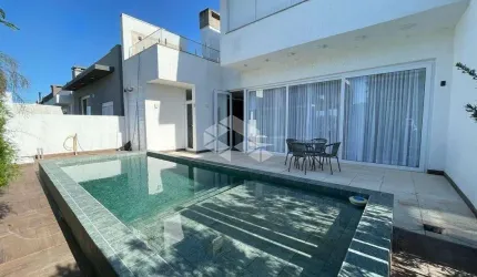 Casa em Condomínio à venda no Blue, Xangri-Lá, com 4 suítes, 277m² e alto padrão de acabamento