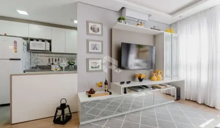 Apartamento semi-mobiliado de 64 m², 2 dormitórios sendo 1 suíte, 1 vaga.