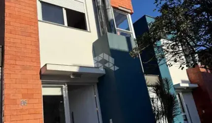 Casa com 2 dormitórios com suíte à venda em Condomínio Fechado em Santa Maria