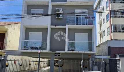 APARTAMENTO 02 QUARTOS, 01 SUITE, PRÓXIMO A UFSM SEMIMOBILIADO 01 VAGA.