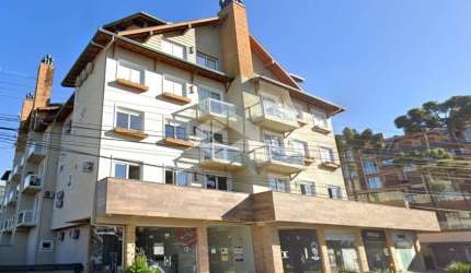 A venda apartamento de 1 dormitório sendo 1 suíte no centro de Canela.