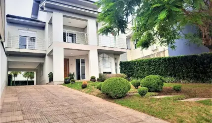 CASA SOBRADO ALTO PADRÃO, 4 DORMITÓRIOS, 3 SUÍTES, BAIRRO BELA VISTA EM CANOAS.