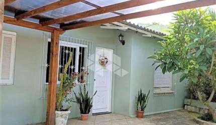 Casa 3 dormitórios, 1 suíte, 2 vagas de garagem, bairro Cinco Colônias em Canoas