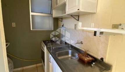 Apartamento 2 dormitórios, mobiliado, 1 banheiro, 1 vaga.