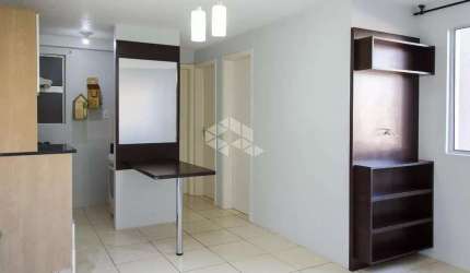 Apartamento semi mobiliado 2 dormitórios em residencial