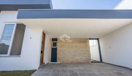Casa térrea com 3 dormitórios sendo 1 suíte, aceita financiamento no Bairro Igara/Canoas.