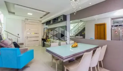 Casa/sobrado 3 Dormitórios,1 suíte, cozinha planejada, sacada, banheiro social, lavabo, área de serviço, sala de jantar e estar . Bairro Mont Serrat