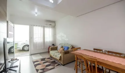 Casa condominio, 58,13 m² de área privadas, 2 dormitórios, living com 3 ambientes, sala de estar, jantar e cozinha, 1 vaga de garagem
