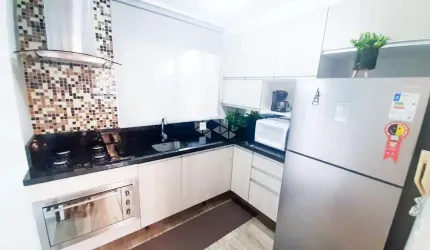 Casa em condominio fechado no bairro Igara com 2 quartos, lavabo, cozinha sob medida, semimobiliada e patio coberto nos fundos com churrasqueira.
