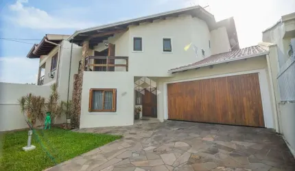 Casa/Sobrado com 228m² 3 dormitórios, 1 suite, sacada, hidro, espaço gourmet e 4 vagas de garagem a venda no bairro Bela Vista/Canoas!