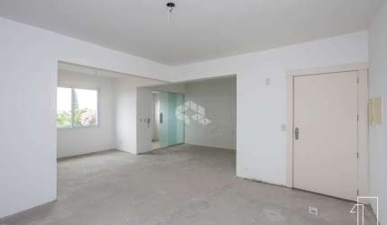Apartamento de 3 dormitórios, sendo 1 suíte, com 2 vagas de garagem, sala ampla. À venda no bairro Nossa Senhora das Graças. Aceita financiamento FGTS