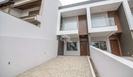 Casa Sobrado 2 Dormitórios com suíte, Sacada, Churrasqueira, lavabo, cozinha e sala integradas, área de serviço, 2 vagas e pátio , São José-Rs