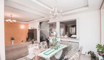 Casa/sobrado com 3 dormitórios, suíte master com hidromassagem, piscina e churrasqueira em Canoas, aceita financiamento e uso do FGTS