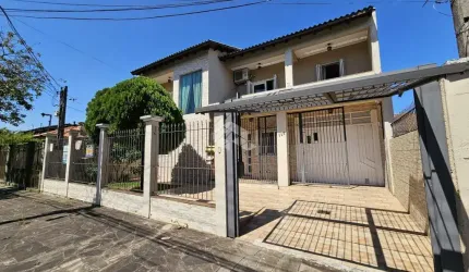 Casa 4 dormitórios com 2 suítes, hidromassagem, pátio com piscina, sala de estar e jantar. A venda no Bairro Bela Vista- Canoas